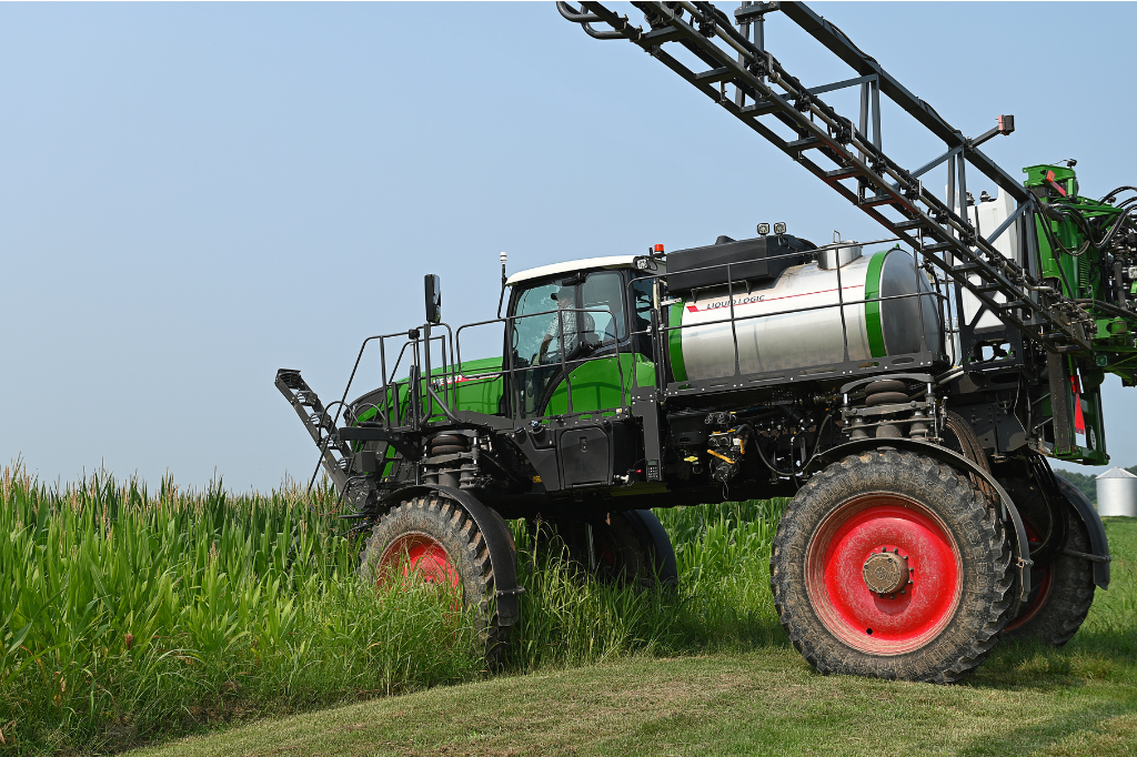 rogator sprayer entering corn field to spray rogator sprayer entering corn field to spray