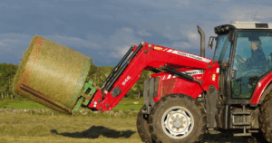 Massey Ferguson baler in action during haying season focused on forage quality